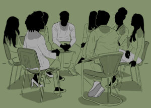 Silhouettes of students sitting in a circle of chairs